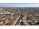 Aerial view of a residential neighborhood, showcasing numerous homes and surrounding landscape at 1801 E Paradise Ln, Phoenix, AZ 85022