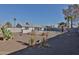 Spacious backyard with gravel and desert plants at 1801 E Paradise Ln, Phoenix, AZ 85022