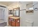 Bathroom with granite vanity and tiled floor at 1801 E Paradise Ln, Phoenix, AZ 85022