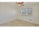 Bright bedroom with tile flooring and ceiling fan at 1801 E Paradise Ln, Phoenix, AZ 85022