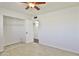 Bedroom with large closet and tile flooring at 1801 E Paradise Ln, Phoenix, AZ 85022