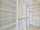 Large walk-in closet with ample shelving at 1801 E Paradise Ln, Phoenix, AZ 85022