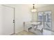 Kitchen nook with white built in bench seating at 1801 E Paradise Ln, Phoenix, AZ 85022