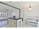 Kitchen island with seating and breakfast nook at 1801 E Paradise Ln, Phoenix, AZ 85022