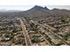 Aerial view of neighborhood with mountain backdrop at 1801 E Paradise Ln, Phoenix, AZ 85022