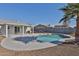 Inviting kidney-shaped pool with a spacious patio area at 1801 E Paradise Ln, Phoenix, AZ 85022