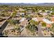 Aerial view of house and neighborhood with mountain backdrop at 18300 E Tonto Verde Dr, Rio Verde, AZ 85263