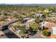 Aerial view of house and surrounding desert landscape at 18300 E Tonto Verde Dr, Rio Verde, AZ 85263