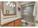 Bathroom with granite countertop vanity and tiled shower at 18300 E Tonto Verde Dr, Rio Verde, AZ 85263