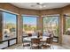 Bright breakfast nook with scenic views and a round table at 18300 E Tonto Verde Dr, Rio Verde, AZ 85263