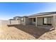 Large backyard with gravel landscaping and block wall at 19028 W Rose Ln, Waddell, AZ 85355