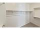 Walk-in closet with ample hanging and shelving space at 19028 W Rose Ln, Waddell, AZ 85355