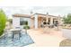 Covered patio with seating area and built-in grill at 19612 N Wasson Peak Dr, Surprise, AZ 85387