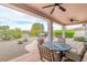 Covered patio with seating area and ceiling fans at 19612 N Wasson Peak Dr, Surprise, AZ 85387