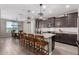 Spacious kitchen with an island, stainless steel appliances, and granite countertops at 19690 W Marshall Ave, Litchfield Park, AZ 85340