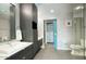 Modern bathroom with double vanity, large walk-in shower, and spacious closet at 200 W Portland St # 715, Phoenix, AZ 85003