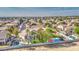 Aerial view of house and neighborhood with pool and basketball court at 20997 N 79Th Ave, Peoria, AZ 85382