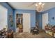 Blue bedroom with closet and built-in shelving at 20997 N 79Th Ave, Peoria, AZ 85382