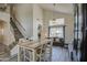 Bright dining area with wood table and staircase view at 20997 N 79Th Ave, Peoria, AZ 85382