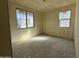 Unfurnished bedroom with new window and wall coverings at 22851 E Lords Way, Queen Creek, AZ 85142