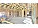 Large unfinished living space showing the framing and electrical work at 22851 E Lords Way, Queen Creek, AZ 85142