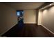 Bedroom at night with dark hardwood floors and city view at 2323 N Central Ave # 906, Phoenix, AZ 85004