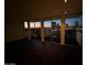 Living room with city view and dark hardwood floors at night at 2323 N Central Ave # 906, Phoenix, AZ 85004