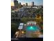 Night view of a community pool and city skyline at 2323 N Central Ave # 906, Phoenix, AZ 85004