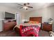 Bright bedroom with double bed, dresser and ceiling fan at 2333 E Southern Ave # 2041, Tempe, AZ 85282