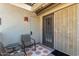 Small patio with seating area outside condo entrance at 2333 E Southern Ave # 2041, Tempe, AZ 85282