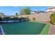 Artificial turf backyard with a view of neighboring homes at 2542 W Kit Carson Trl, Phoenix, AZ 85086