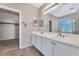 Double vanity bathroom with a walk-in shower at 2542 W Kit Carson Trl, Phoenix, AZ 85086