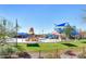 Community pool with water features and playground equipment at 2542 W Kit Carson Trl, Phoenix, AZ 85086