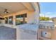 Outdoor kitchen with built-in grill and countertop at 2542 W Kit Carson Trl, Phoenix, AZ 85086