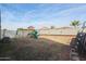 Large backyard with playset and firepit at 29362 W Weldon Ave, Buckeye, AZ 85396