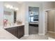 Bathroom with double vanity and view of bedroom at 29362 W Weldon Ave, Buckeye, AZ 85396