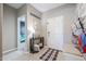 Bright entryway with bench, storage, and decorative accents at 29362 W Weldon Ave, Buckeye, AZ 85396