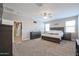 Main bedroom with large bed and dresser at 29362 W Weldon Ave, Buckeye, AZ 85396