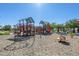 playground with various play structures and wood-chip surface at 29362 W Weldon Ave, Buckeye, AZ 85396