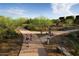 Paved pathway winding through desert landscape, perfect for biking at 32496 N 135Th Dr, Peoria, AZ 85383