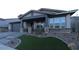 Charming single-Gathering home with a covered porch, stone accents, and a well-manicured front yard at 32496 N 135Th Dr, Peoria, AZ 85383