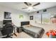 Well-lit bedroom with gaming setup and basketball hoop at 3610 N 106Th Ave, Avondale, AZ 85392