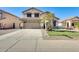 Two-story house with a two-car garage and landscaped front yard at 3610 N 106Th Ave, Avondale, AZ 85392