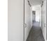 Clean and modern hallway leading to a spacious bathroom at 3928 E Crittenden Ln, Phoenix, AZ 85018