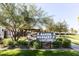 Landscaped community area with seating and signage for a local shop at 3928 E Crittenden Ln, Phoenix, AZ 85018