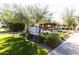 Community area with pergola, fire pit, and landscaping at 3928 E Crittenden Ln, Phoenix, AZ 85018