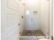 Walk-in shower with pebble tile floor and glass enclosure at 3928 E Crittenden Ln, Phoenix, AZ 85018