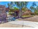 The Arbors community entrance with a stone arch and landscaping at 3984 E Los Altos Dr, Gilbert, AZ 85297