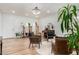 Living room with hardwood floors, comfy chairs, and a chandelier at 3984 E Los Altos Dr, Gilbert, AZ 85297