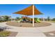 Community playground with shade structure and play equipment at 4145 E Kolin Ln, San Tan Valley, AZ 85143